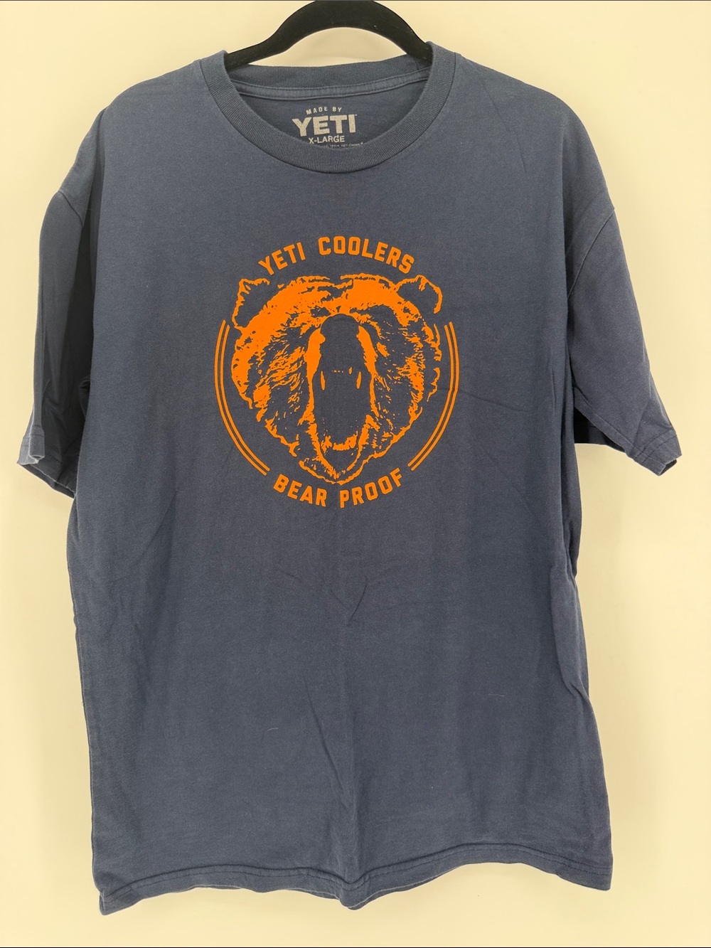 Yeti Men's Navy Short-Sleeve Tee with Orange Bear Graphic